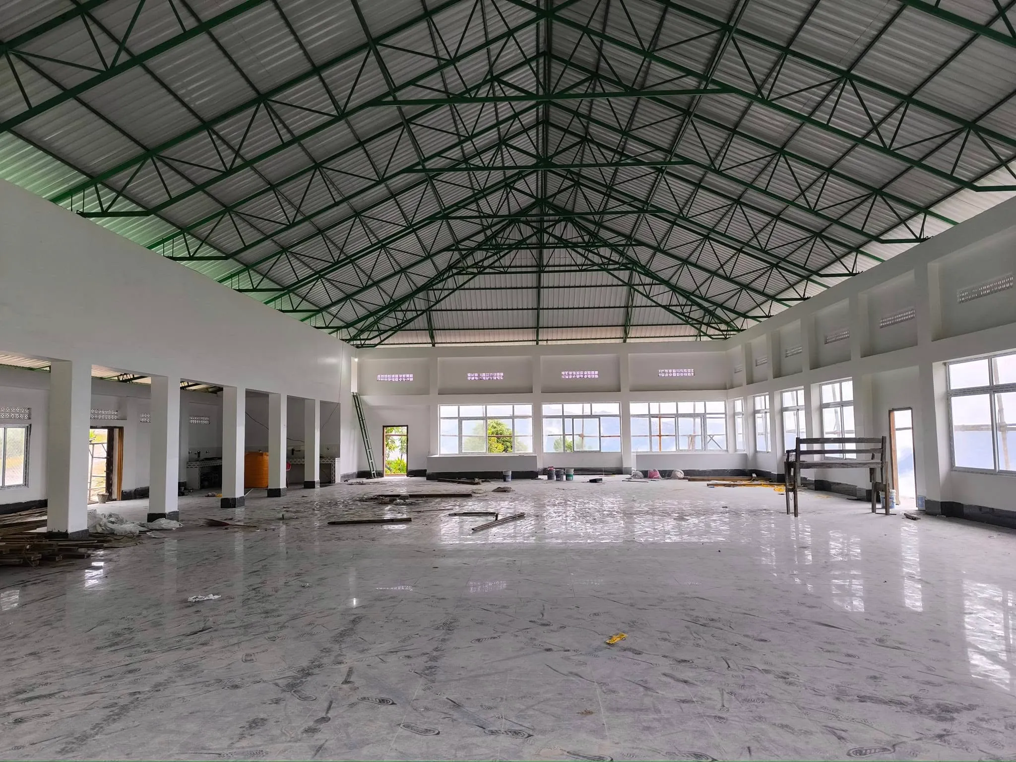 Community hall — floor tiling and interior painting by Ningshen Painting Work, Ukhrul, Manipur